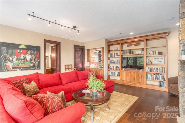 2461 Eagles Nest Rd, Waynesville, NC 28786 - living room with dark wood-style floors, recessed lighting, and a textured ceiling