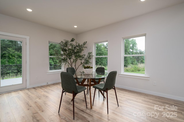 207 9th Ct NE, Conover, NC 28613 - dining room with baseboards, light wood finished floors, and recessed lighting