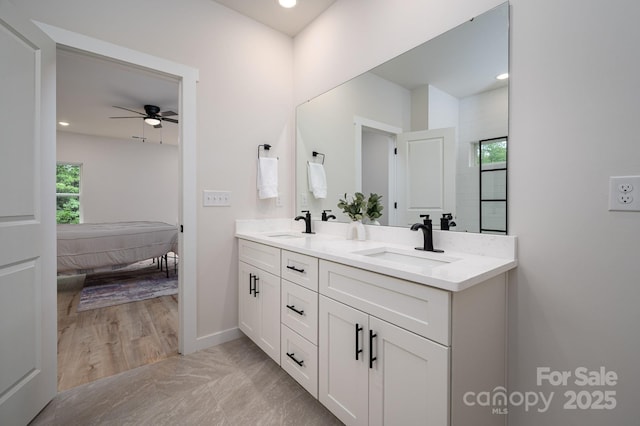 207 9th Ct NE, Conover, NC 28613 - full bathroom with ensuite bath, healthy amount of natural light, a ceiling fan, double vanity, and recessed lighting