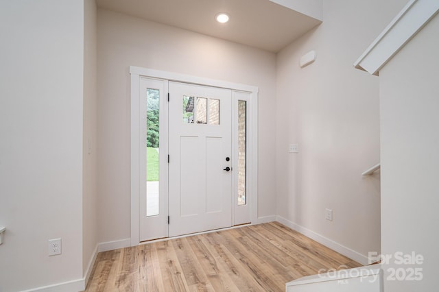 207 9th Ct NE, Conover, NC 28613 - foyer with light wood finished floors, baseboards, and recessed lighting