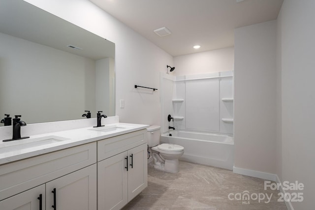 207 9th Ct NE, Conover, NC 28613 - full bath featuring toilet, double vanity, shower / bath combination, recessed lighting, and baseboards