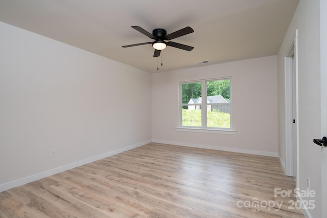 207 9th Ct NE, Conover, NC 28613 - empty room with baseboards, ceiling fan, and light wood-style floors