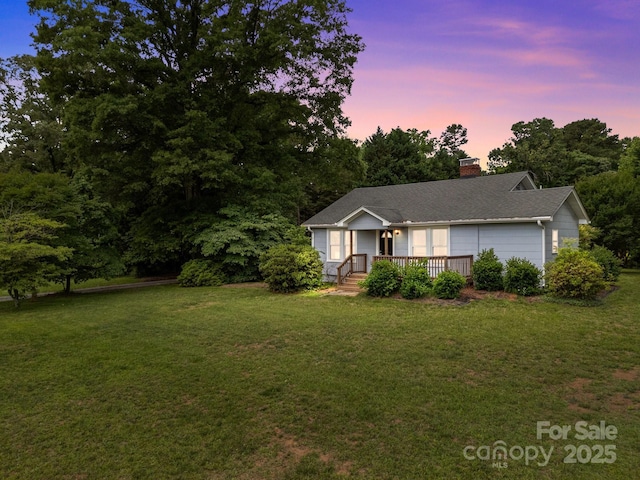 5371 Davidson Rd, Davidson, NC 28036 - ranch-style home with a yard, a chimney, and covered porch