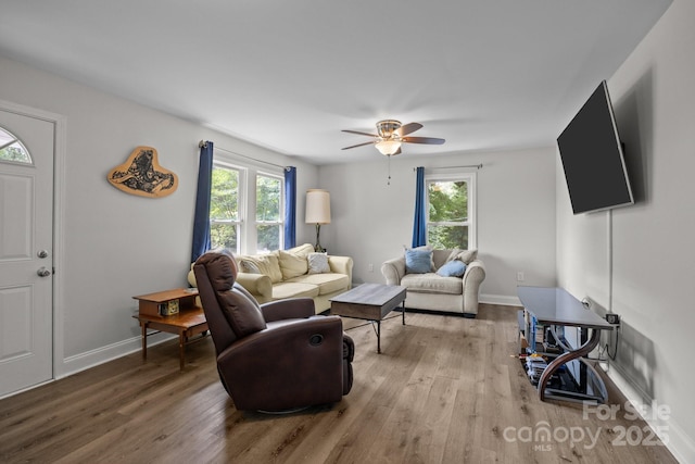 5371 Davidson Rd, Davidson, NC 28036 - living room featuring wood finished floors, ceiling fan, and baseboards