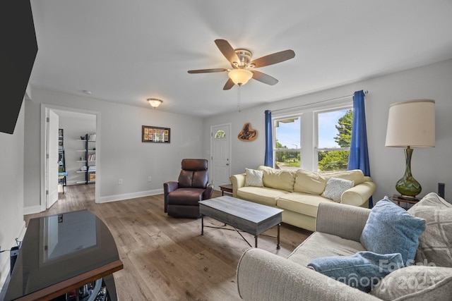 5371 Davidson Rd, Davidson, NC 28036 - living room featuring a ceiling fan, wood finished floors, and baseboards