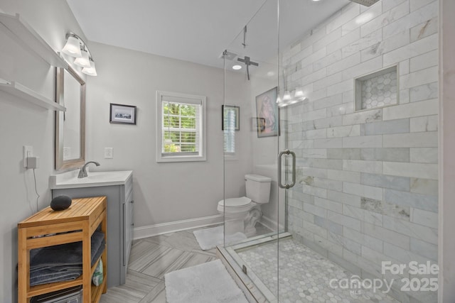 5371 Davidson Rd, Davidson, NC 28036 - full bath featuring a shower stall, vanity, toilet, and baseboards