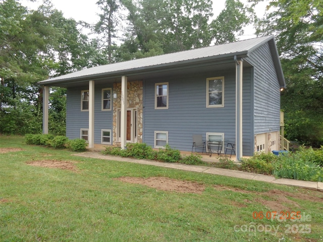 1203 Dudley Shoals Rd, Granite Falls, NC 28630 - raised ranch featuring metal roof and a front lawn