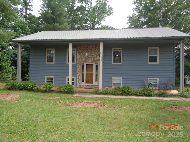 1203 Dudley Shoals Rd, Granite Falls, NC 28630 - split foyer home featuring a front yard and metal roof