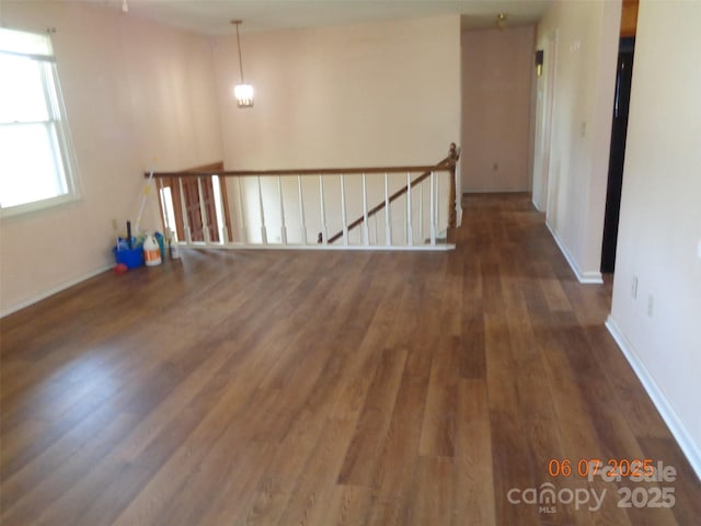 1203 Dudley Shoals Rd, Granite Falls, NC 28630 - empty room with wood finished floors and baseboards