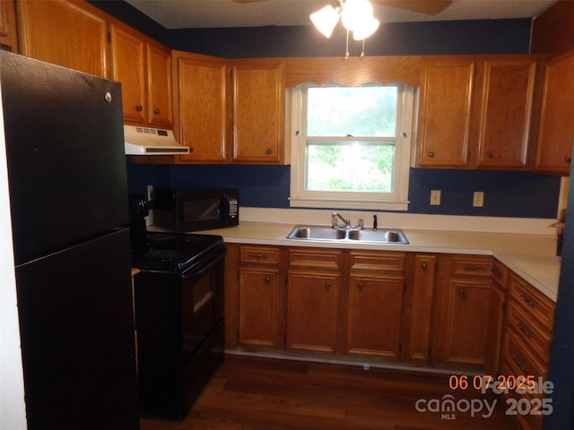 1203 Dudley Shoals Rd, Granite Falls, NC 28630 - kitchen with black appliances, under cabinet range hood, a sink, light countertops, and ceiling fan