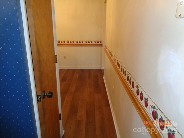 1203 Dudley Shoals Rd, Granite Falls, NC 28630 - hall featuring dark wood-style floors and baseboards