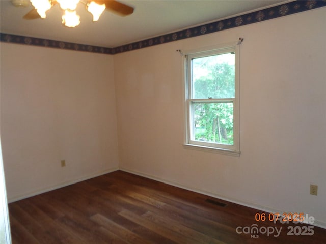 1203 Dudley Shoals Rd, Granite Falls, NC 28630 - unfurnished room featuring dark wood-style floors, baseboards, and ceiling fan