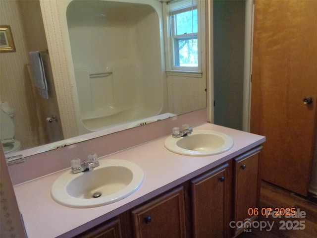 1203 Dudley Shoals Rd, Granite Falls, NC 28630 - bathroom featuring double vanity, toilet, and a shower