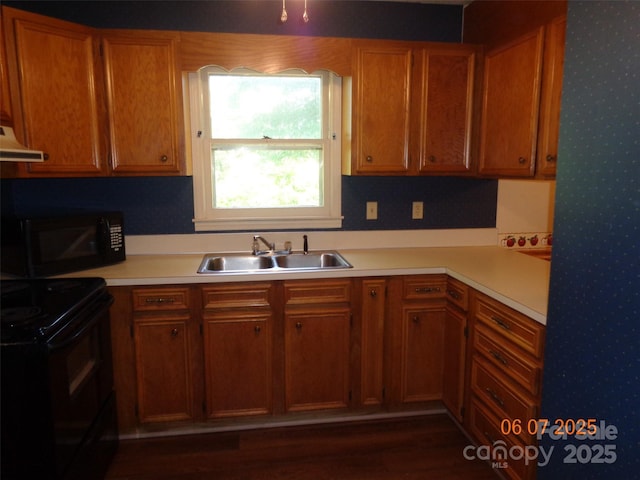 1203 Dudley Shoals Rd, Granite Falls, NC 28630 - kitchen featuring black appliances, a sink, wallpapered walls, light countertops, and extractor fan