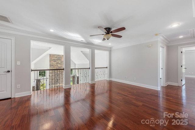 unfurnished room with ceiling fan, wood finished floors, recessed lighting, baseboards, and ornamental molding
