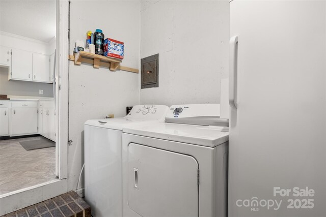 3900 Langley Rd, Charlotte, NC 28215 - laundry room featuring separate washer and dryer, electric panel, and crown molding