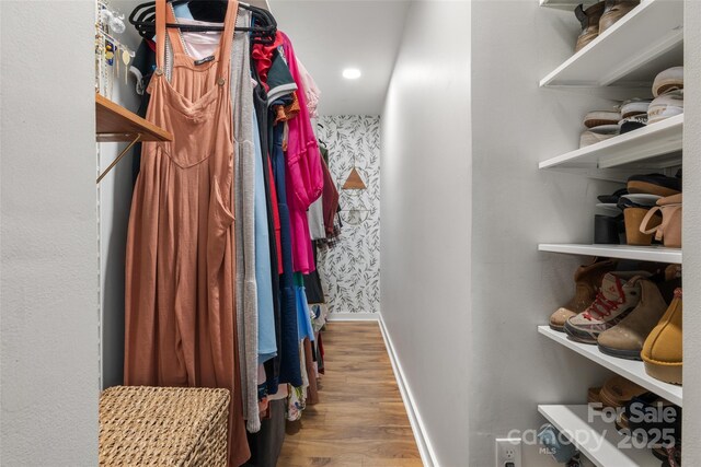 3900 Langley Rd, Charlotte, NC 28215 - walk in closet featuring wood finished floors