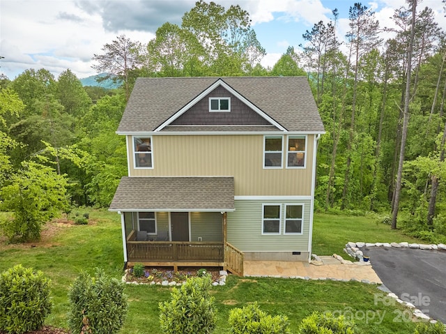 43 Clarks Chapel Ext, Weaverville, NC 28787 - view of front of house featuring a front lawn, roof with shingles, a forest view, and crawl space