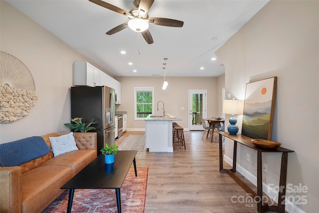 43 Clarks Chapel Ext, Weaverville, NC 28787 - living room with light wood-style floors, recessed lighting, ceiling fan, and baseboards