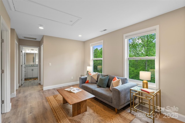43 Clarks Chapel Ext, Weaverville, NC 28787 - living area featuring attic access, baseboards, wood finished floors, and recessed lighting