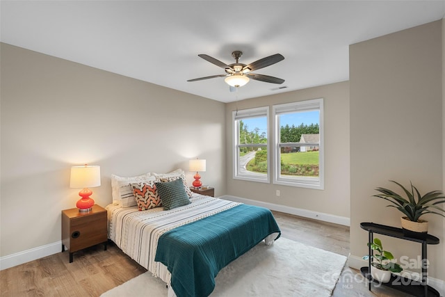 43 Clarks Chapel Ext, Weaverville, NC 28787 - bedroom featuring baseboards, wood finished floors, and a ceiling fan