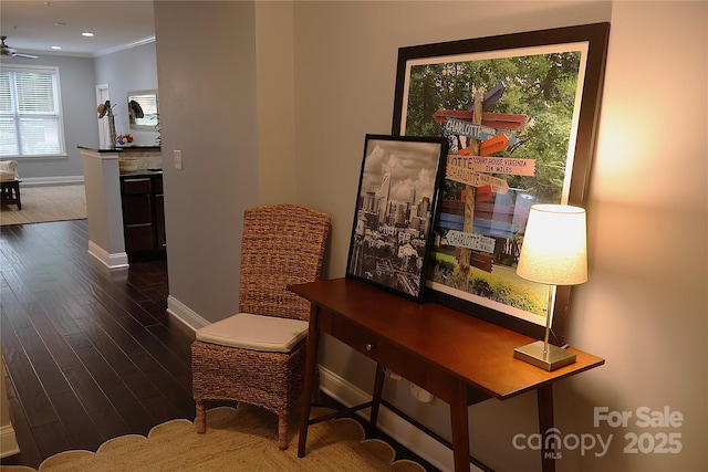 1000 E Woodlawn Rd Unit 107, Charlotte, NC 28209 - sitting room with baseboards, wood finished floors, crown molding, a ceiling fan, and recessed lighting