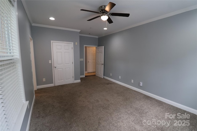 1000 E Woodlawn Rd Unit 107, Charlotte, NC 28209 - unfurnished bedroom with dark colored carpet, baseboards, crown molding, recessed lighting, and ceiling fan