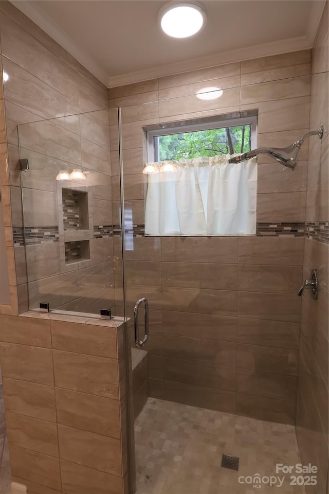 1000 E Woodlawn Rd Unit 107, Charlotte, NC 28209 - full bath featuring a stall shower and ornamental molding