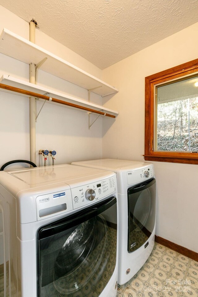 491 Mckenzie Way S, Old Fort, NC 28762 - laundry area featuring independent washer and dryer and a textured ceiling