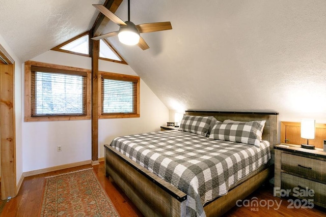 491 Mckenzie Way S, Old Fort, NC 28762 - bedroom with lofted ceiling, wood finished floors, and a ceiling fan
