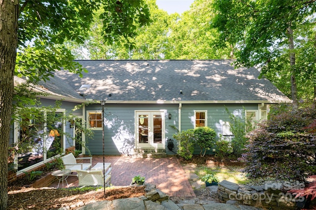 287 Anne St, Rutherfordton, NC 28139 - rear view of property featuring a shingled roof, a patio area, and french doors