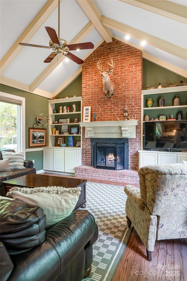 287 Anne St, Rutherfordton, NC 28139 - living area featuring ceiling fan, wood finished floors, a brick fireplace, and built in features