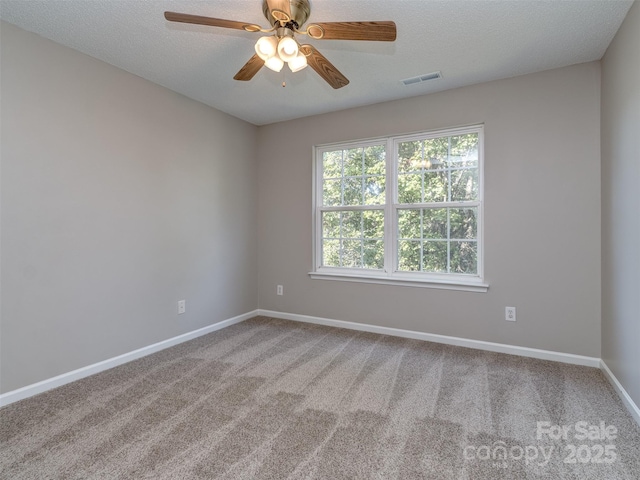 4208 Everest Dr, Gastonia, NC 28054 - carpeted spare room featuring baseboards, ceiling fan, and a textured ceiling