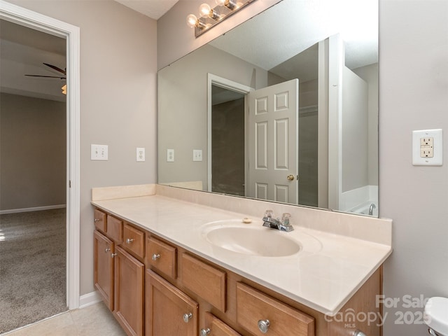 4208 Everest Dr, Gastonia, NC 28054 - bathroom with vanity, a ceiling fan, baseboards, and tile patterned floors