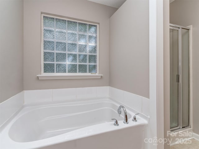 4208 Everest Dr, Gastonia, NC 28054 - bathroom with a stall shower and a garden tub