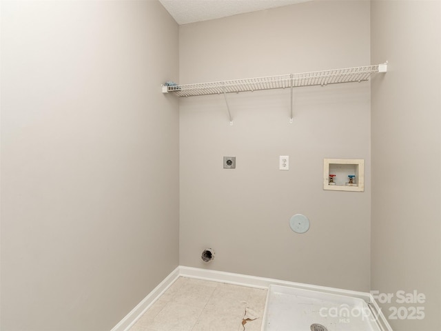 4208 Everest Dr, Gastonia, NC 28054 - clothes washing area featuring hookup for a washing machine, hookup for an electric dryer, baseboards, and light tile patterned floors