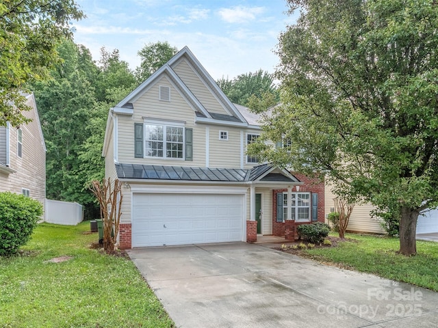 4208 Everest Dr, Gastonia, NC 28054 - view of front of house featuring brick siding, a standing seam roof, concrete driveway, an attached garage, and metal roof
