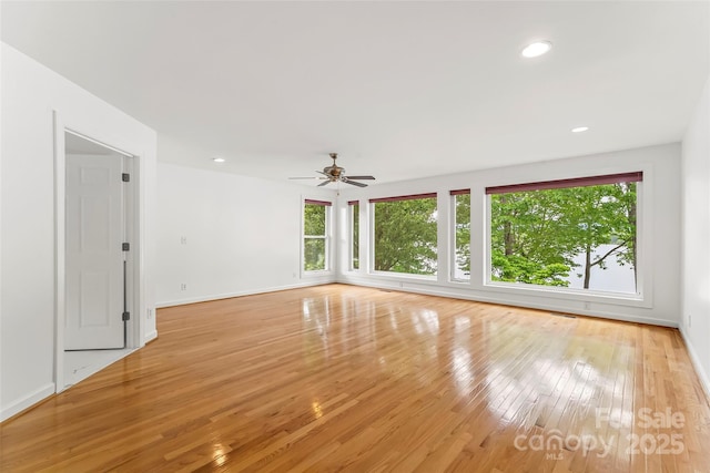 2218 Mallard Cove Dr, Nebo, NC 28761 - spare room featuring light wood finished floors, baseboards, ceiling fan, and recessed lighting