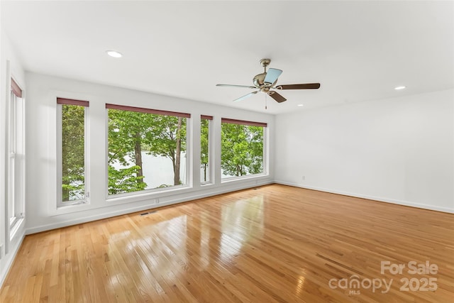 2218 Mallard Cove Dr, Nebo, NC 28761 - unfurnished room featuring a ceiling fan, wood-type flooring, baseboards, and recessed lighting