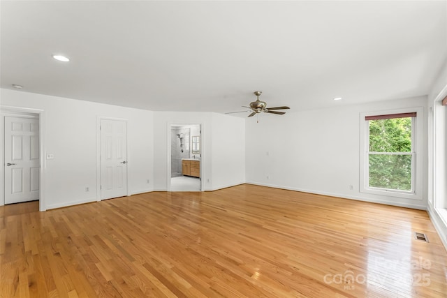 2218 Mallard Cove Dr, Nebo, NC 28761 - unfurnished living room featuring ceiling fan, light wood-style floors, baseboards, and recessed lighting