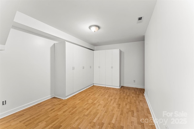 2218 Mallard Cove Dr, Nebo, NC 28761 - unfurnished bedroom featuring light wood-style floors and baseboards