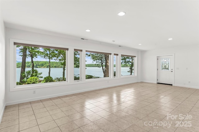 2218 Mallard Cove Dr, Nebo, NC 28761 - unfurnished room featuring light tile patterned floors, baseboards, recessed lighting, and a water view