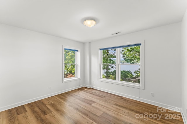 2218 Mallard Cove Dr, Nebo, NC 28761 - spare room featuring wood finished floors and baseboards