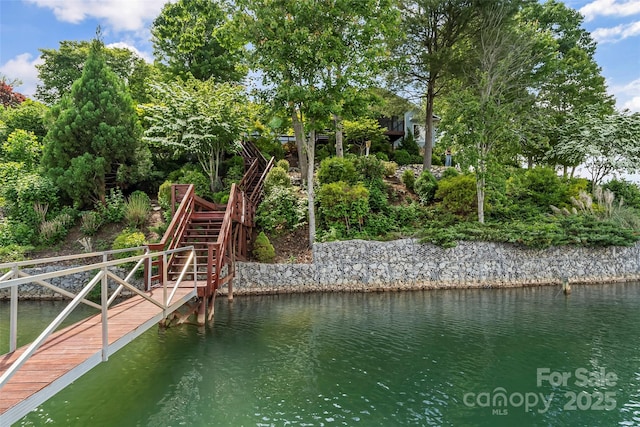2218 Mallard Cove Dr, Nebo, NC 28761 - dock area featuring stairway, a water view, and view of wooded area