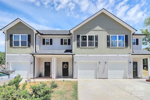 1066 Mclain Rd Unit 14, Kannapolis, NC 28083 - view of front of property with a garage, concrete driveway, covered porch, and a shingled roof