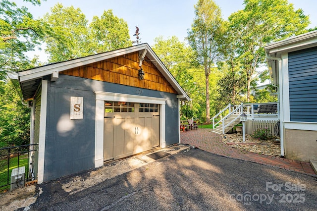 225 Rectory Hill Pl SW, Lenoir, NC 28645 - detached garage with driveway and fence