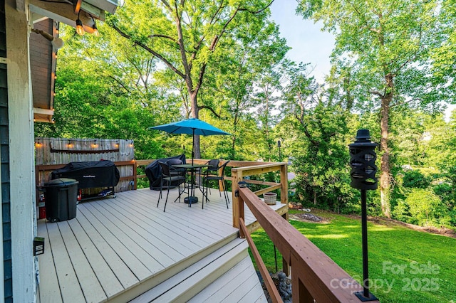 225 Rectory Hill Pl SW, Lenoir, NC 28645 - wooden terrace featuring outdoor dining area and view of scattered trees