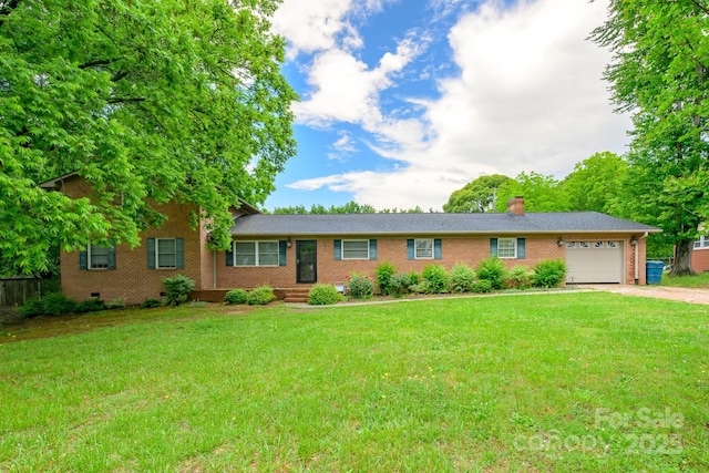 ranch-style home featuring a garage, dirt driveway, brick siding, and a front lawn