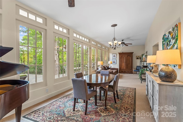 26 White Oak Rd, Asheville, NC 28803 - carpeted dining area featuring a chandelier and baseboards