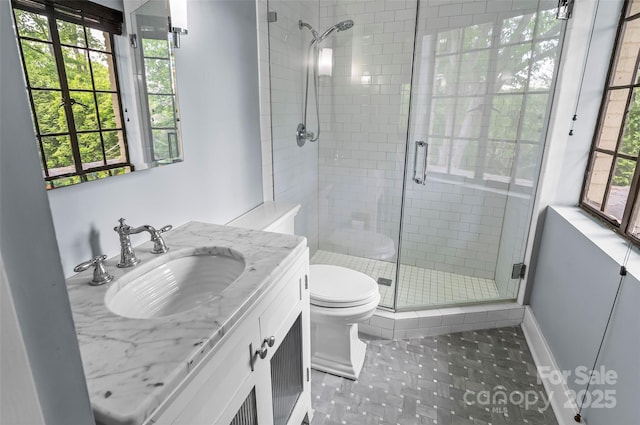 26 White Oak Rd, Asheville, NC 28803 - full bath featuring a shower stall, toilet, and vanity